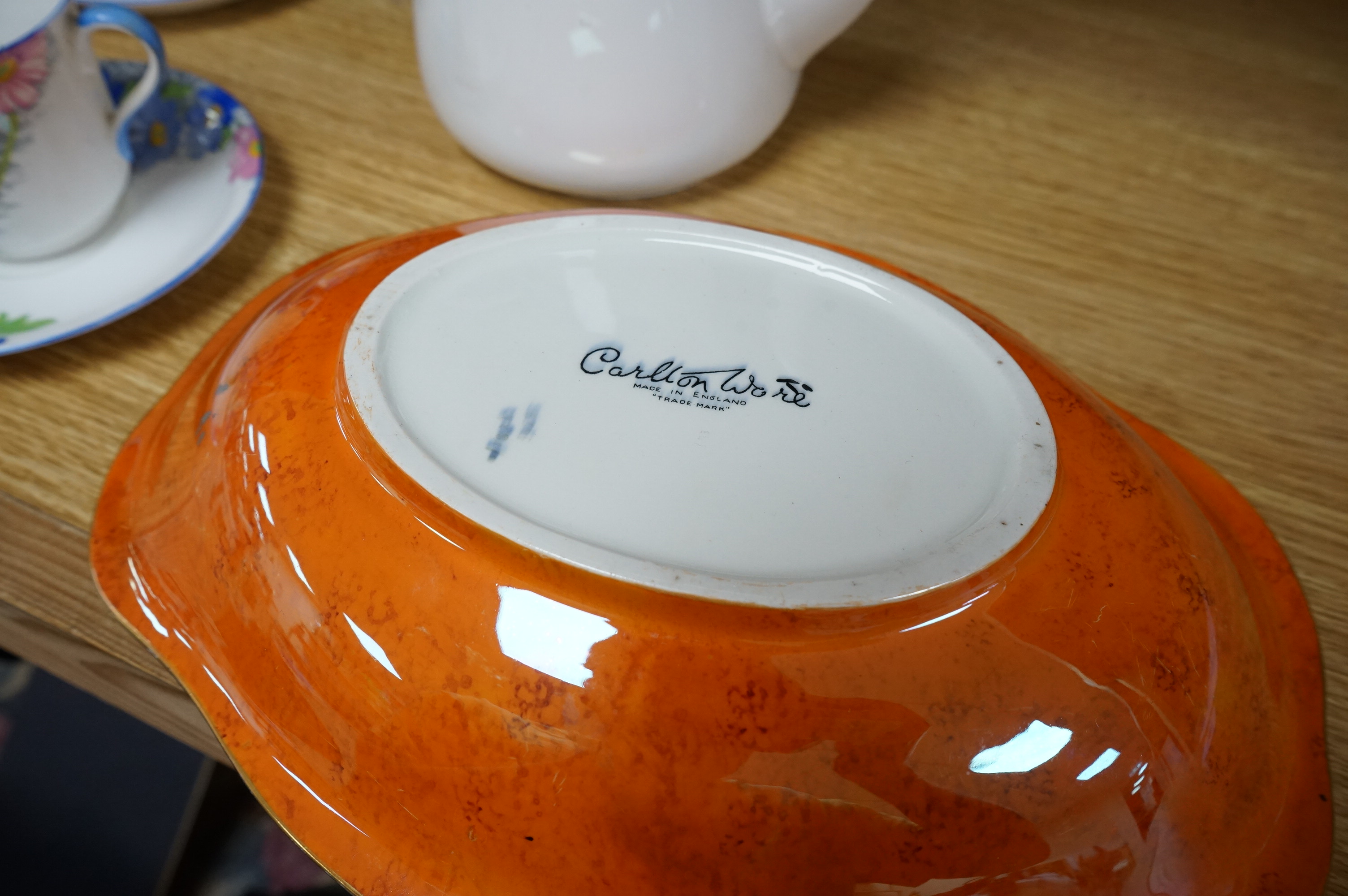 A Shelley porcelain coffee set and a Carltonware Jazz pattern dish, largest 23cm high. Condition - good